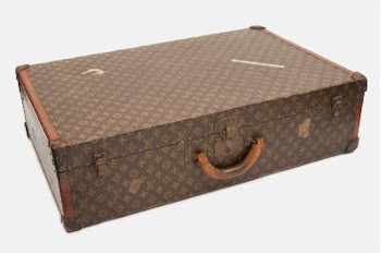 The sale also includes a Louis Vuitton suitcase (FS23/459), estimated at £1,200-£1,500.