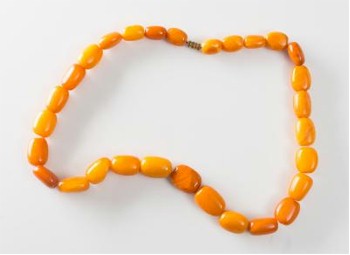 Amber jewellery is increasingly popular at the moment as was proved in the sale by several examples, including this graduated amber bead necklace (FS23/185) that
        sold for £1,600.