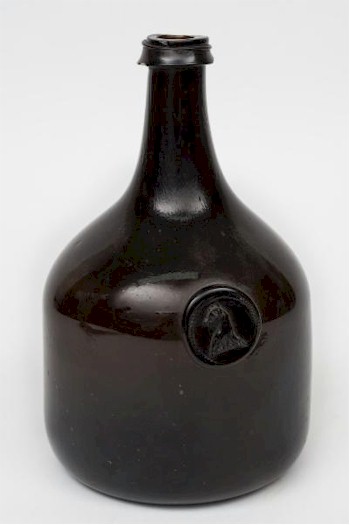 A mid 18th century sealed mallet shaped wine bottle (FS24/369) from around 1745-50 is inviting bids of between £400 and £600.