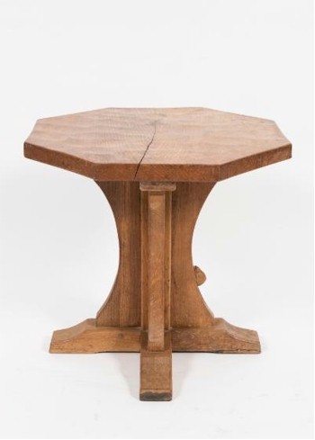 An octagonal occasional table (FS24/866) produced by Robert 'Mouseman' Thompson of Kilburn has a pre-sale estimate of £300-£500.