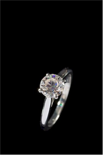 The top lot within the Jewellery auction was a stunning Cartier platinum and diamond single stone ring (FS24/194) fetching
        £14,000.
