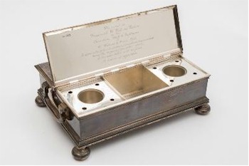 A George V silver desk inkstand (FS24/11) realised £1,500 in the opening silver auction within the Autumn 2014 Fine Sale at the South West
        of England Auction Complex in Exeter.
