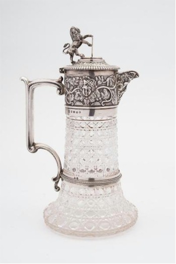 A Victorian silver mounted, cut glass claret jug (FS24/5) produced by Frederick Elkington of Birmingham in 1886 fetched £1,300.
