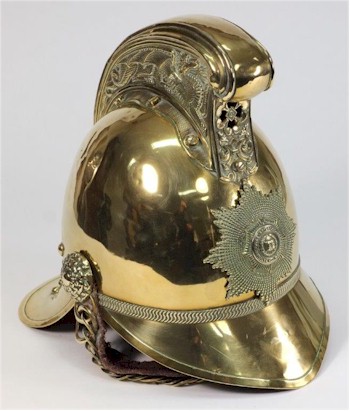 An Edwardian Brass Merryweather Pattern Fireman's Helmet
        (SC20/543), which carries a pre-sale estimate of £700-£900.