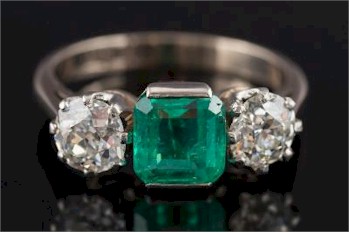 An 18ct White Gold, Emerald and Diamond Three Stone Ring (FS28/274) is one of the highlights of the Jewellery auction.