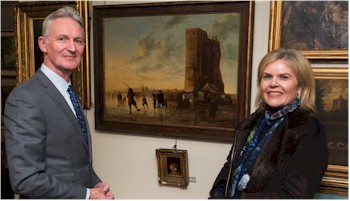 Mark Kingscote and Rebecca Trethewey admire a Dutch school painting at the Bearnes
        Hampton & Littlewood private view for the January 2016 fine art auction held
        on 15th January 2016 in Exeter.