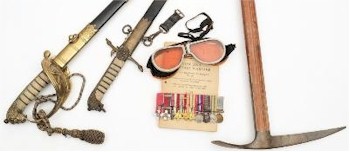 Lieutenant Col Terrence 'Sailor' Kitcat CBE DSO MC: A Miniature Group of Ten Medals, A George V Royal Naval Dress Sword and Dirk as well as a pair of Amber Snow Goggles and a Pick (SC22/360).