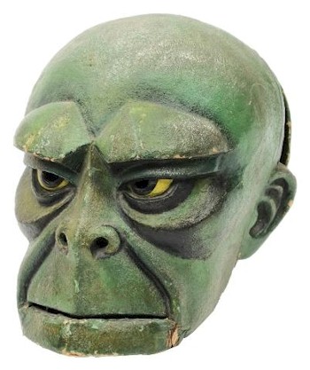 Dan Dare and the Mekon: a green mache Mekon publicity mask from the first Hutton Boys & Girls exhibition, Olympia 1956 (SC22/1200).