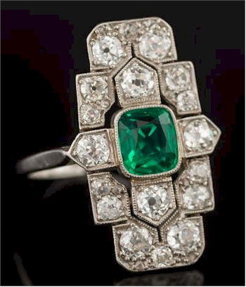 The jewellery also includes an Art Deco emerald and diamond rectangular plaque ring
        (FS33/287).