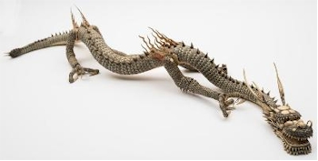 The Works of Art auction includes this large Japanese carved and stained ivory articulated dragon (FS33/888).