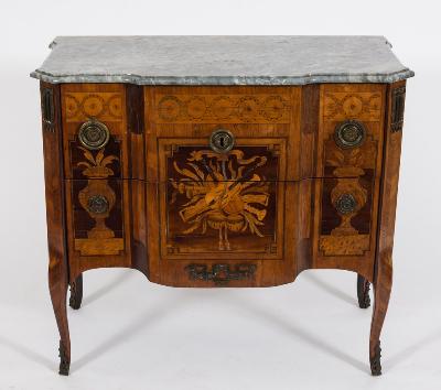 The sale also includes a Louis XV/XVI Transitional Kingwood, Marquetry and Gilt
        Metal Mounted Block Front Commode (FS33/1182).