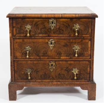 An Apprenticeman's 18th Century Walnut Oyster Veneer Chest (FS33/1097) also sold for £4,400 in the Furniture section of the sale.