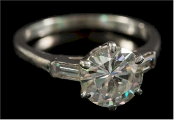 This 20th Century Diamond Solitaire Ring (FS41/229) realised £5,100.