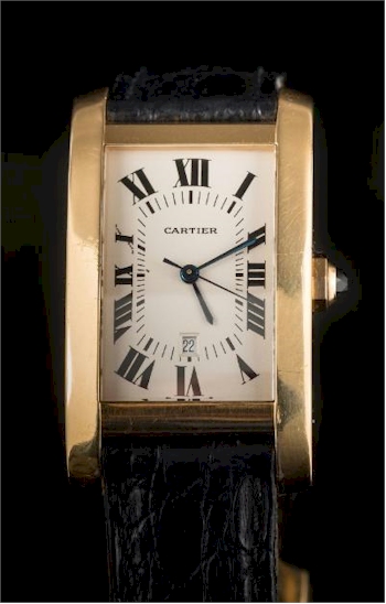 A Cartier 18K Tank Americaine Automatic Calendar Wristwatch (FS41/167) fetched £5,000.