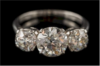 A Diamond Three-stone Ring (FS43/304), which realised £6,000.