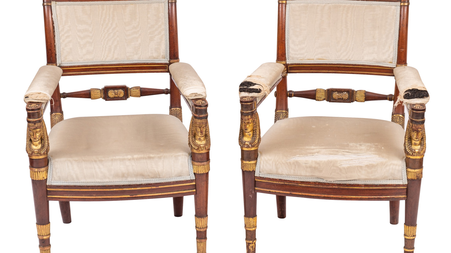 A pair of fine late Empire or Restauration mahogany and parcel gilt fauteuils