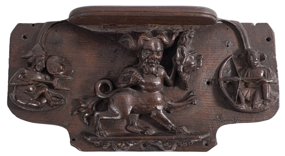 A Late 14Th:Early 15Th Century Carved Oak Misericord The Seat Supported By A Manticore