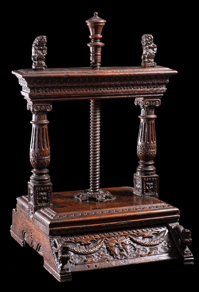 A Fine James I Dated Oak Press The Top Carved With Bands Of Arcading And Guilloche