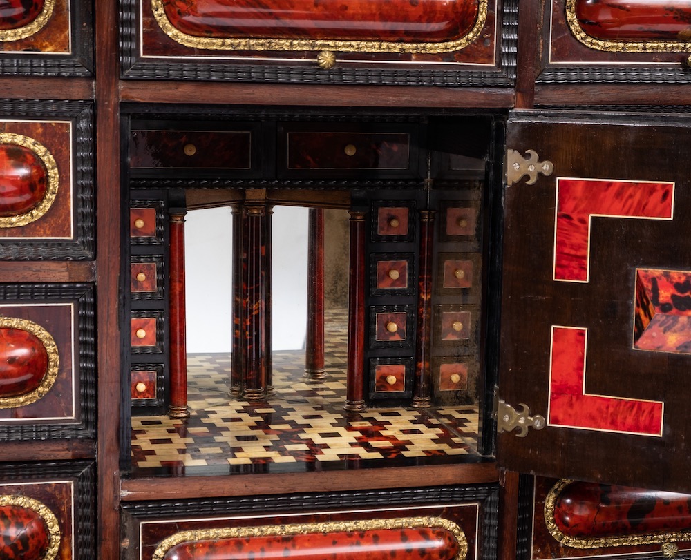 A 19Th Century Flemish Simulated Scarlet Tortoiseshell, Ebony And Ivory Inlaid Architectural Cabinet