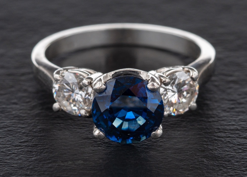 A Sapphire And Diamond Three Stone Ring