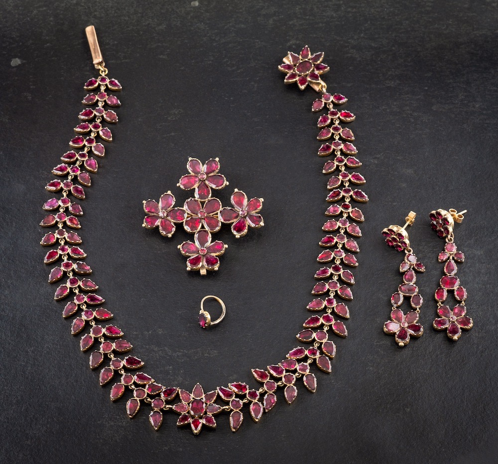 A 19Th Century, Gold, Foiled Back, Garnet Parure Of Stylised Flowerhead Design
