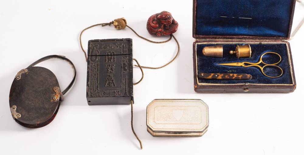 A Japanese Lacquered Single Section Inro With Moulded Decoration